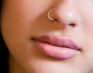 Ear lobe or nose nostril piercing